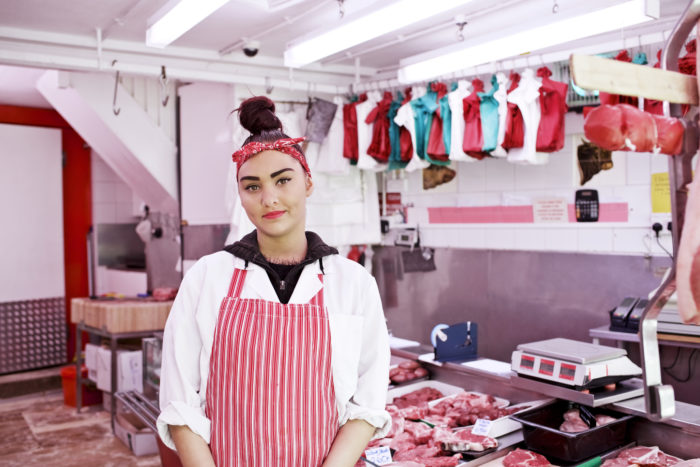 Portrait of a young female butcher